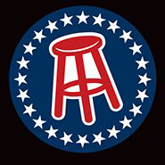 A red stool sitting in the middle of a circle.
