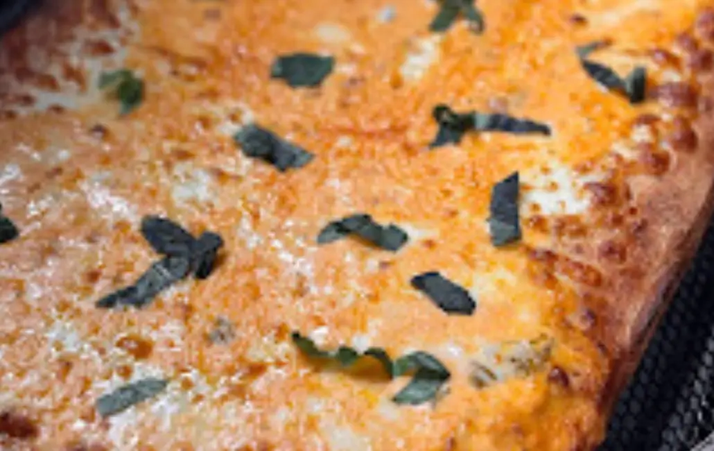 A close up of some food with leaves on it